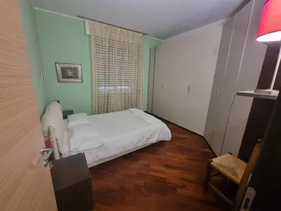 Letto o letti in una camera di Casa Via Asti