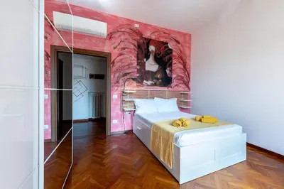 Letto o letti in una camera di Appartamento d'artiste