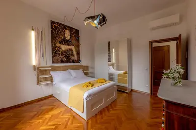 Letto o letti in una camera di Appartamento d'artiste
