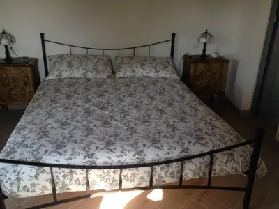 Letto o letti in una camera di La Corte del Borgo