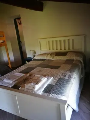 Letto o letti in una camera di La Corte del Borgo