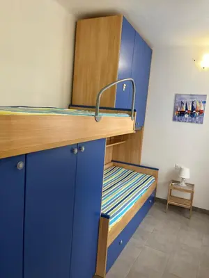 Letto o letti in una camera di Casa Stella di Mare