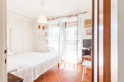 Letto o letti in una camera di Casa vista mare, Levanto