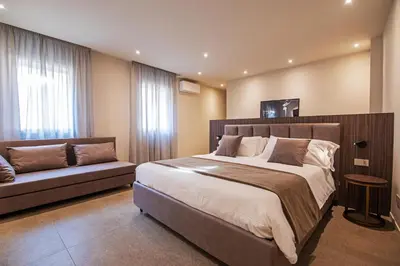 Letto o letti in una camera di Modena Relax Luxury Rent Rooms
