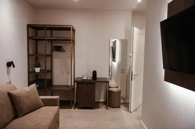 TV o dispositivi per l'intrattenimento presso Modena Relax Luxury Rent Rooms