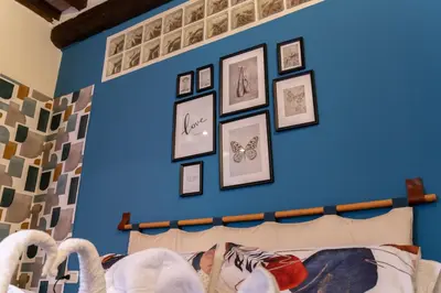 Letto o letti in una camera di Appartamento comfort - Freedom Industrial