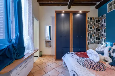 Letto o letti in una camera di Appartamento comfort - Freedom Industrial