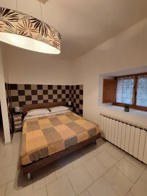 Letto o letti in una camera di La Quercia D'Oro