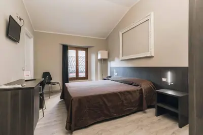 Letto o letti in una camera di Hotel Astoria