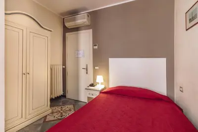 Letto o letti in una camera di Hotel Astoria