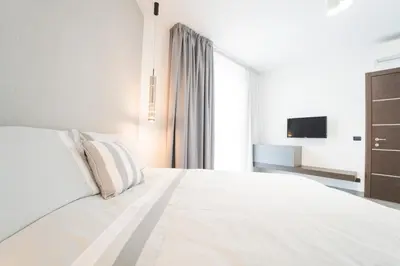 Letto o letti in una camera di Casa Grace