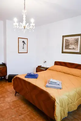 Letto o letti in una camera di CàGrande