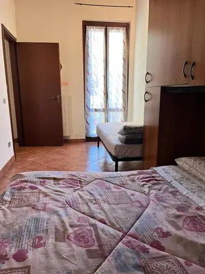 Letto o letti in una camera di maison iris