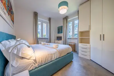 Letto o letti in una camera di CASA GINESTRA Vacanza tra mare e cielo