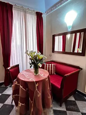 Area soggiorno di Giglio Rosso Suite