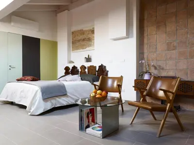 Letto o letti in una camera di B&B Sottotetto
