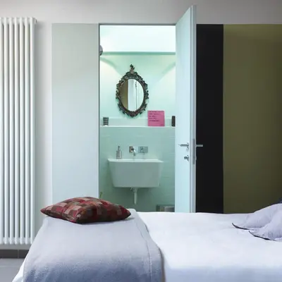 Letto o letti in una camera di B&B Sottotetto