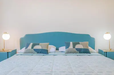 Letto o letti in una camera di Dolcevita PentHouse - A due passi dalla Ghirlandina