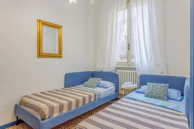 Letto o letti in una camera di Dolcevita PentHouse - A due passi dalla Ghirlandina