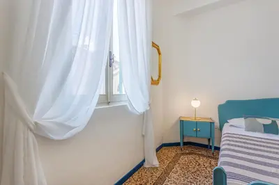 Letto o letti in una camera di Dolcevita PentHouse - A due passi dalla Ghirlandina
