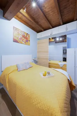 Letto o letti in una camera di Federico House - by Host4U