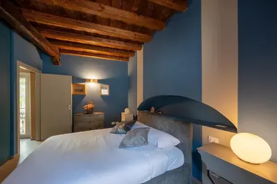 Letto o letti in una camera di Happy Days - Pavia City - by Host4U -