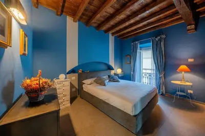 Letto o letti in una camera di Happy Days - Pavia City - by Host4U -