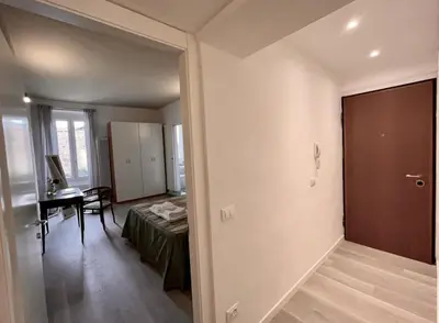 Letto o letti in una camera di Inn Borromeo - Pavia City - by HOST4U