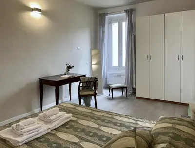 Letto o letti in una camera di Inn Borromeo - Pavia City - by HOST4U