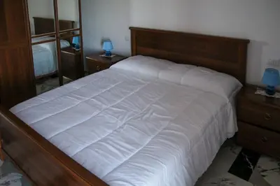 Letto o letti in una camera di La notte sull'isola - Montaretto - tra il cielo e il mare