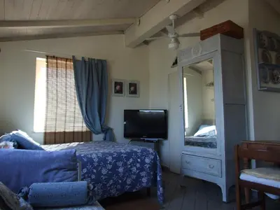 Letto o letti in una camera di Lo Chalet sul Golfo