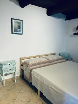 Letto o letti in una camera di Al Castello