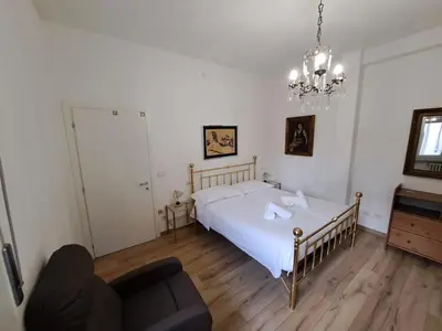 Letto o letti in una camera di FuoriPorta Affitti Brevi - The Cesare