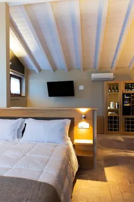Letto o letti in una camera di Mulino di Casa Sforza Suites and Spa
