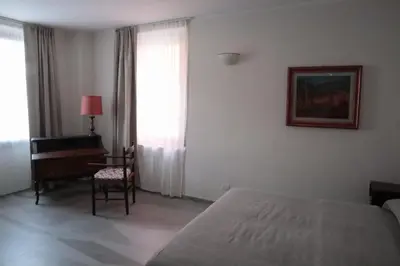 Letto o letti in una camera di Piccolo Bacco dei Quaroni