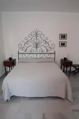 Letto o letti in una camera di Piccolo Bacco dei Quaroni