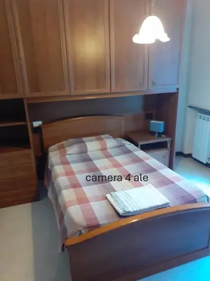 Letto o letti in una camera di Locanda Primo Sole