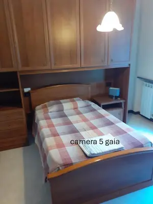 Letto o letti in una camera di Locanda Primo Sole