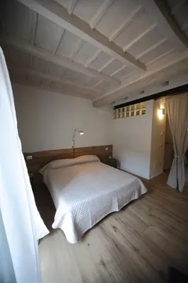 Letto o letti in una camera di 32 BnB Camerecaffè