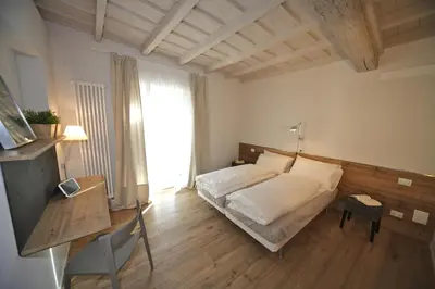 Letto o letti in una camera di 32 BnB Camerecaffè