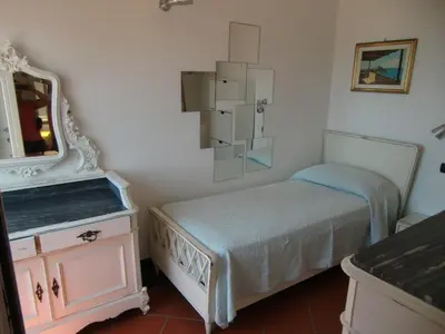 Letto o letti in una camera di La casa di Flavia