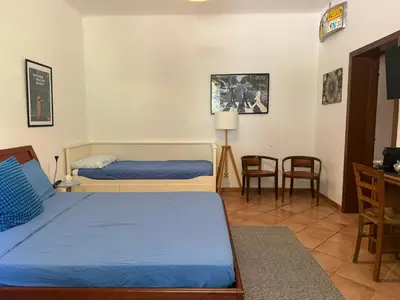 Letto o letti in una camera di Teseo