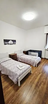 Letto o letti in una camera di Casa Emma