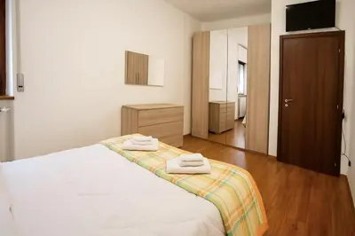 Letto o letti in una camera di Casa Emma