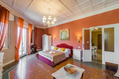 Letto o letti in una camera di Casa Vittoria