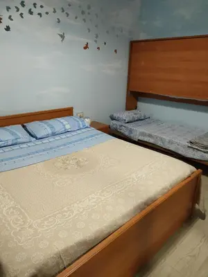 Letto o letti in una camera di Casa gialla