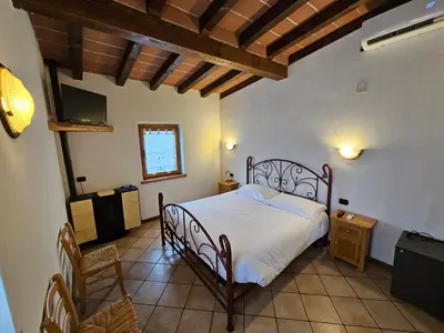 Letto o letti in una camera di Agriturismo L'Urteia