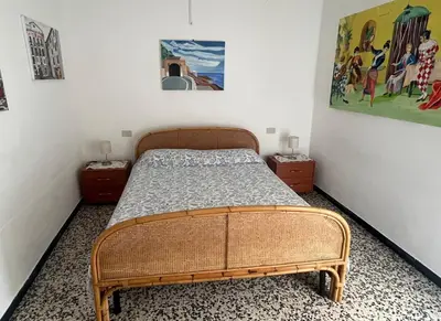 Letto o letti in una camera di Piano terra con giardino
