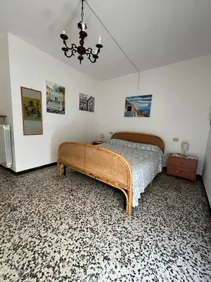 Letto o letti in una camera di Piano terra con giardino