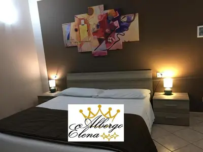 Letto o letti in una camera di albergo